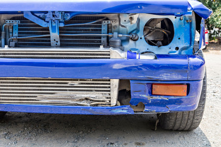 Blue Car crash, damaged automobiles after collision in cityの写真素材