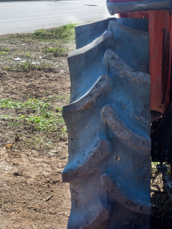 Close up of tractor wheel, selective focus.の写真素材