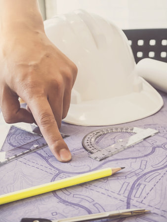 Architect point at blueprint, architectural conceptの写真素材