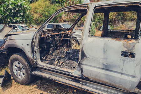 burnt car by accident in vehicle junkの写真素材