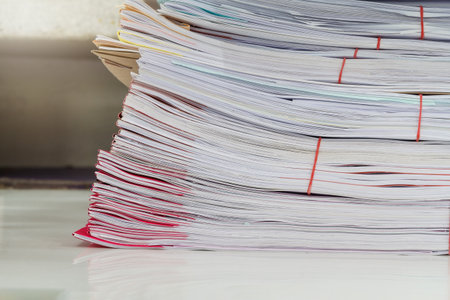 Close up of business documents stack on desk , report papers stackの写真素材