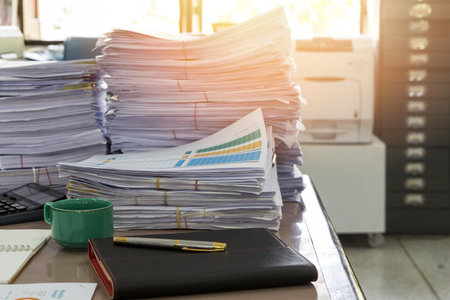 Close up of business documents stack on desk , report papers stack