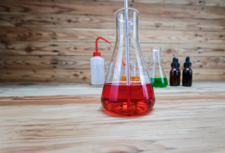 Beaker and bottle. Several chemical solution in flask. Laboratory glassware