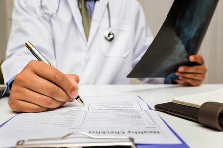 Doctor diagnose and analyze on x-ray film of patient.の写真素材