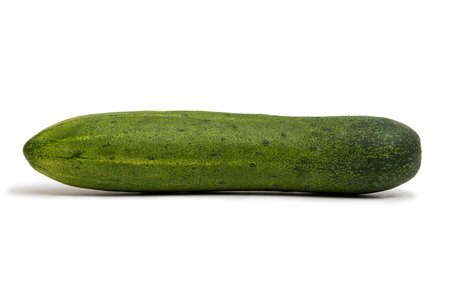 A cucumber isolated on a white background.の写真素材