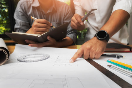 Confident team of architect working together in a office.They discussing about new startup project...