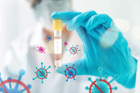 Researchers test blood samples in the laboratory. Researchers are inventing vaccines to treat...