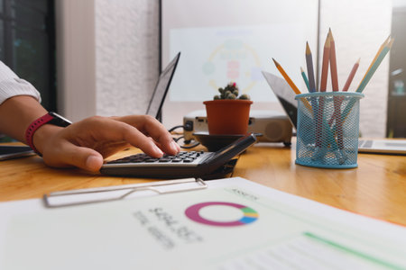 Financial businessman accounting calculating cost economic budget in home office. Investment and...
