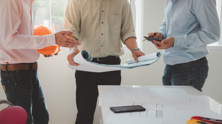 Confident team of architect working together in a office.Then discussing about new startup project...