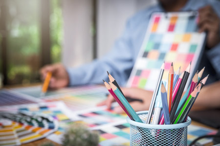 Colorful pencil in box on desk in office.の写真素材
