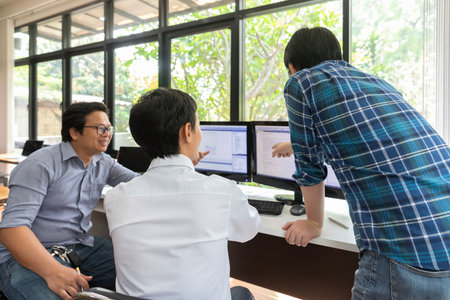 Programmers team working in a software developing. Developing programming and coding technologies. Website design. Cyber space concept.の写真素材