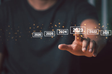 A man touching on virtual screen 2023. Business new year concept, welcome to year 2023 concept.の写真素材