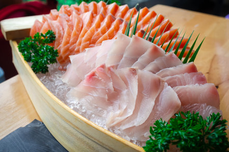 Sashimi set, Tai, , Sea Bass, Snapper and Imitation Crab Stick on dish in traditional Japanese food style.の写真素材
