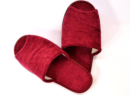 Red slipper on white background on top viewの写真素材