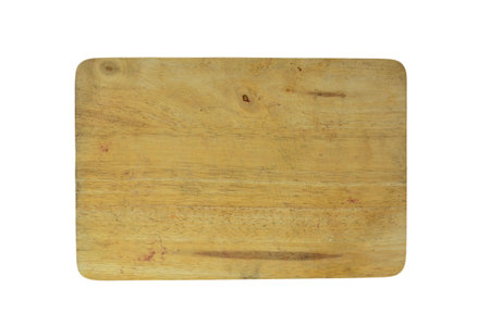 Old cutting board on white background on top viewの写真素材