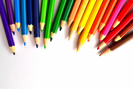 Rainbow of color pencils isolated on white backgroundの写真素材