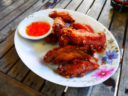 Chicken fried with herb is thai foodの写真素材