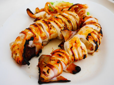 Sour and spicy steam squids grilled in thai foodwith selective focusの写真素材