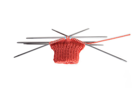 wool glove knitting guidelines on white backgroundの写真素材
