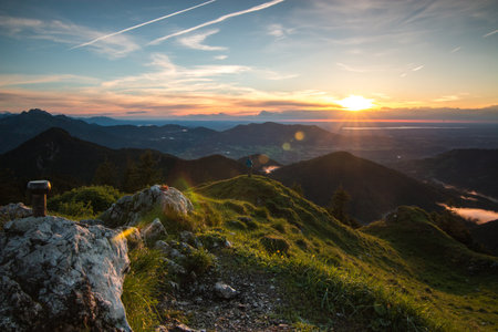 Sundown lights on top of Bavarian Mountainsの写真素材