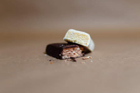 Closeup protein bar in the cut on the baking paperの写真素材