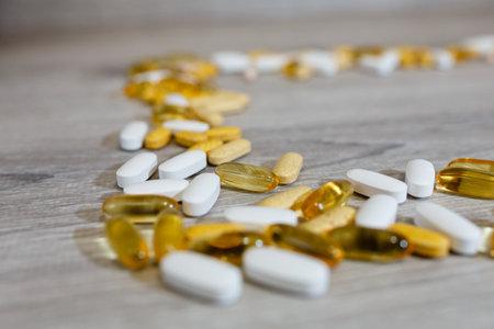 CLose up Omega 3 tablets and capsules, carnitine, creatine, fat burners, BCAA or testosterone booster.の写真素材