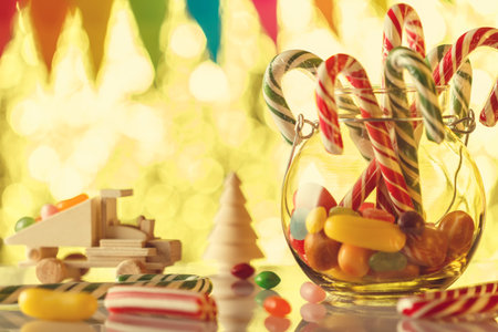 Cane caramel, in a glass jar. All for a sweet nice holiday. Children's card. Ready greeting. Retro toning.の写真素材