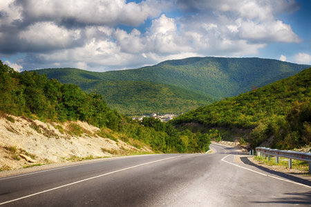 Mountain road, paved road serpentine in the mountains. Mountain landscape.の写真素材