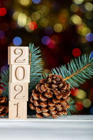 Happy new year 2021. Wooden cubes with numbers. Year of the bull. Blurred background.の写真素材