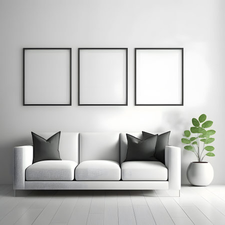 Interior of modern living room with white sofa and empty frames on the wallの素材