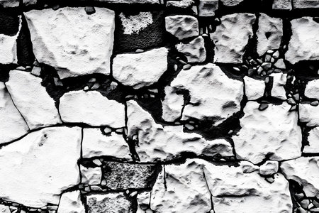 Background of stone wall texture. black and white. Abstract background for design.の素材