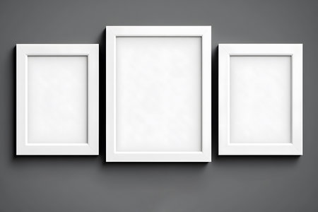 Three white photo frames isolated on black background. 3D illustration.の素材