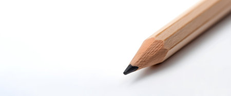 Pencil isolated on a white background. Close-up shot.の素材