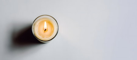 Candle on a white background. View from above. copy space.の素材