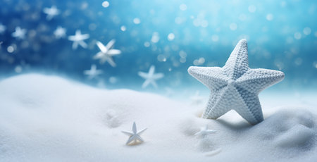 Christmas background with starfish and snowflakes on blue bokehの素材