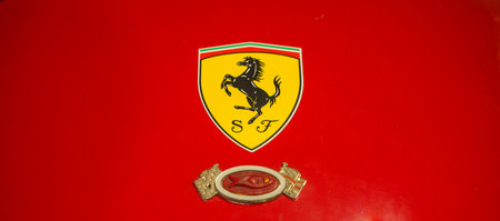 Ferrari Logo on Red Car Hood with Additional Emblemのeditorial素材