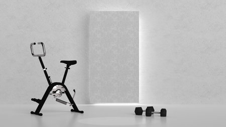 Modern exercise bike in minimalist room, with dumbbells on the floor. High quality photoの写真素材