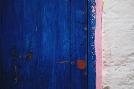 Bright blue painted wooden door backgroundの写真素材