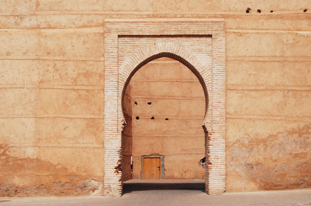 Ocher color, classic arch architecture style enterance, medina, Marrakesh, Moroccoの写真素材
