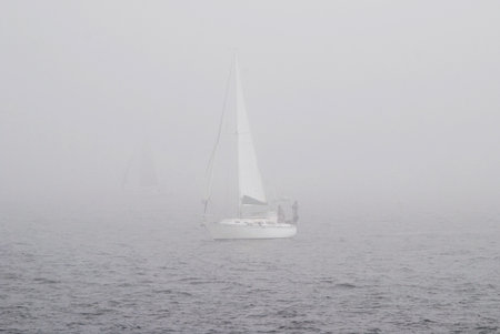 Dense fog, sailing in the morning, Atlantic oceanの写真素材
