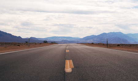 Road trip landscape with mountains, Death Valley National Park, USAの写真素材