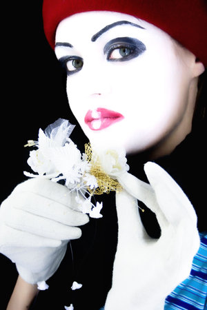 mime with a flower on a black backgroundの写真素材