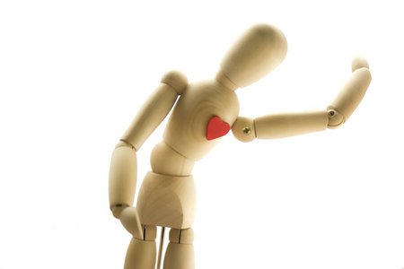 Wooden human Dummy isolated on a white backgroundの写真素材