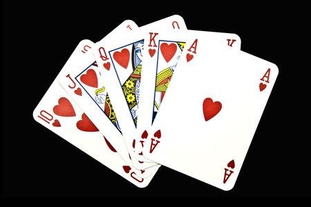 Playing cards on a green backgroundのeditorial素材