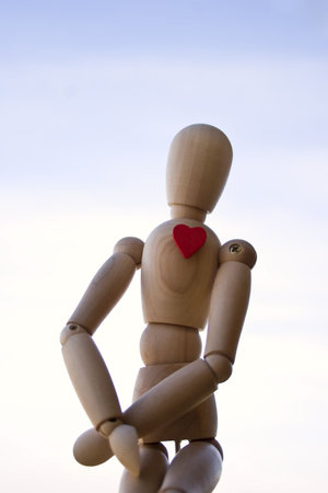 Wooden dummy against the skyの写真素材