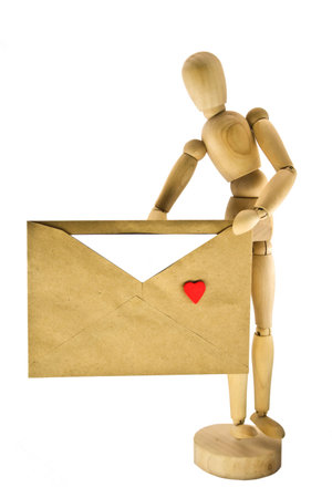Wooden dummy with an envelopeの写真素材