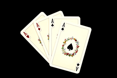 Old playing cards on a black backgroundのeditorial素材