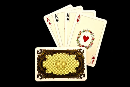 Old playing cards on a black backgroundのeditorial素材