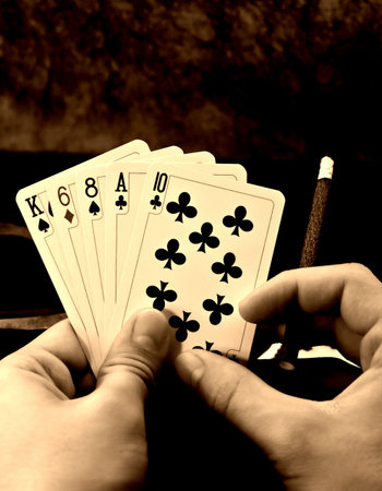 Playing cards in a hand
