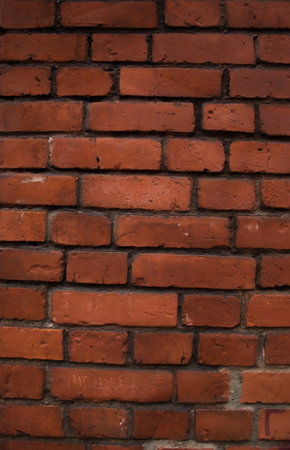 Structure of an old red brick wall 